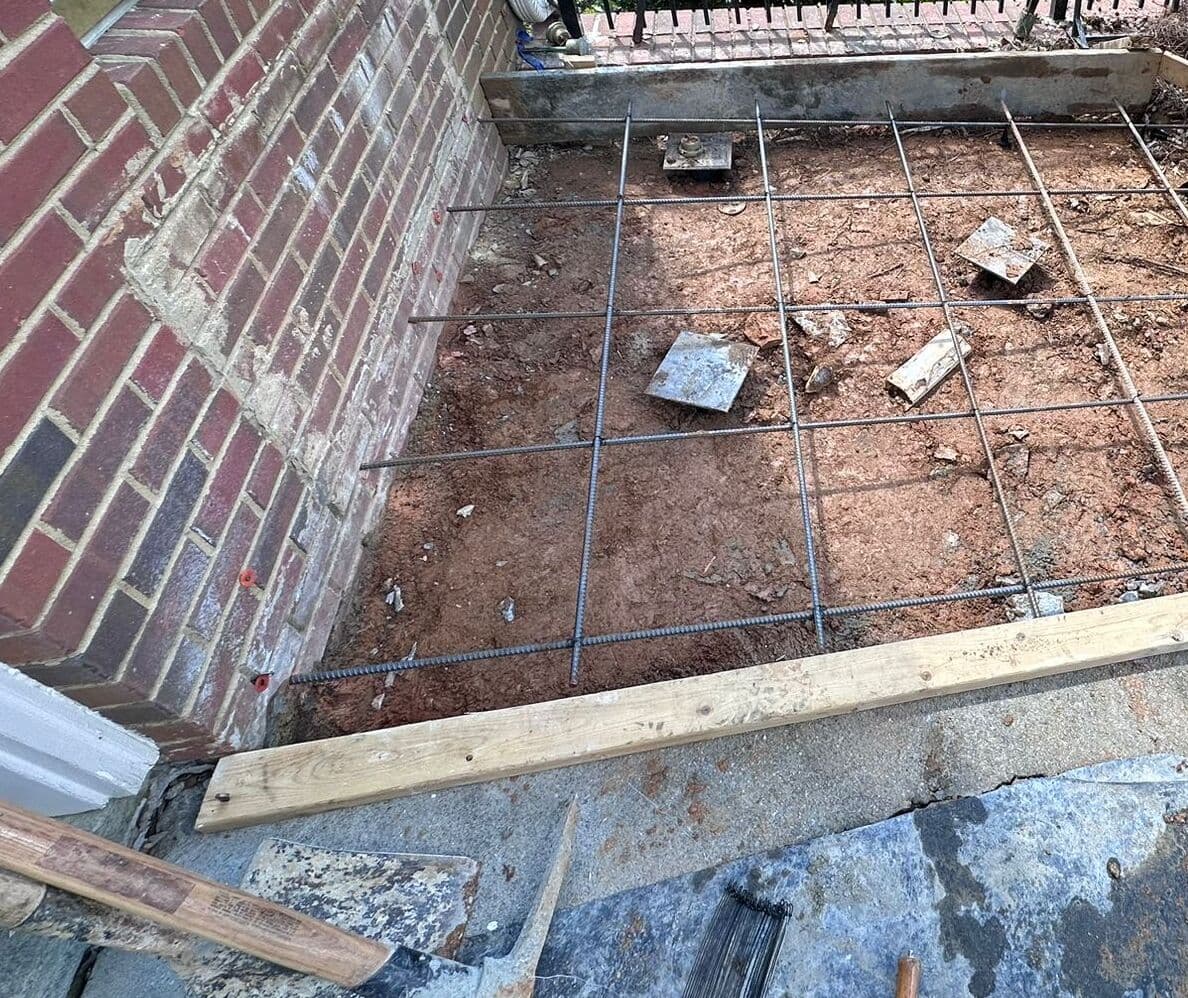 Landing formed with lumber, rebar and wire mesh before the concrete